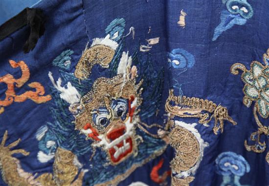 A Chinese embroidered silk and metal thread dragon robe, late 19th / early 20th century, faults